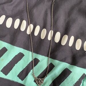 Elegant Silver Necklace with Intricate Pendant